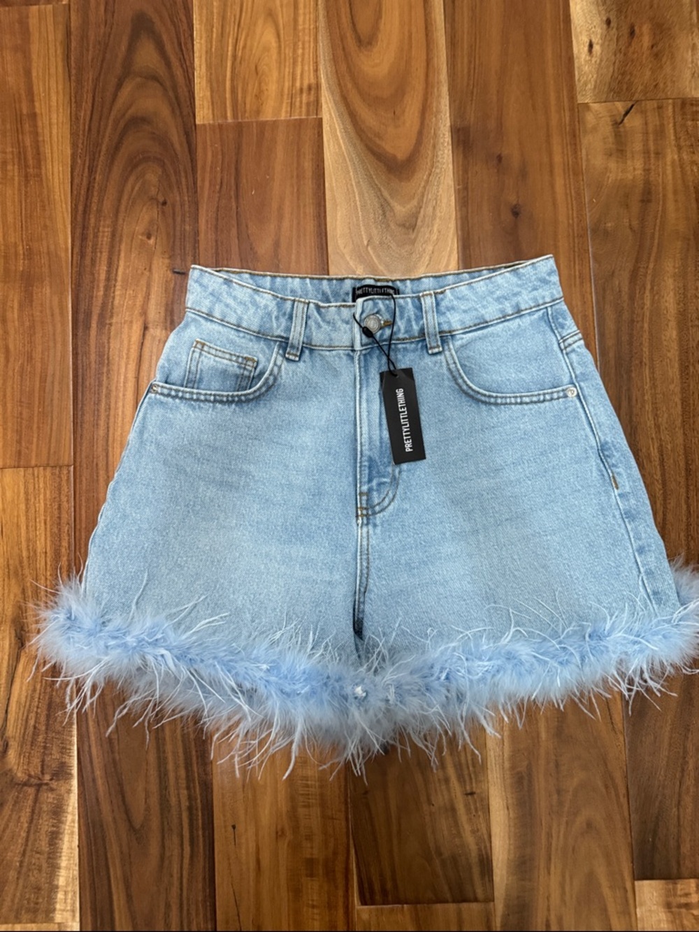 PrettyLittleThing Pale Blue Denim Shorts with Feather Trim